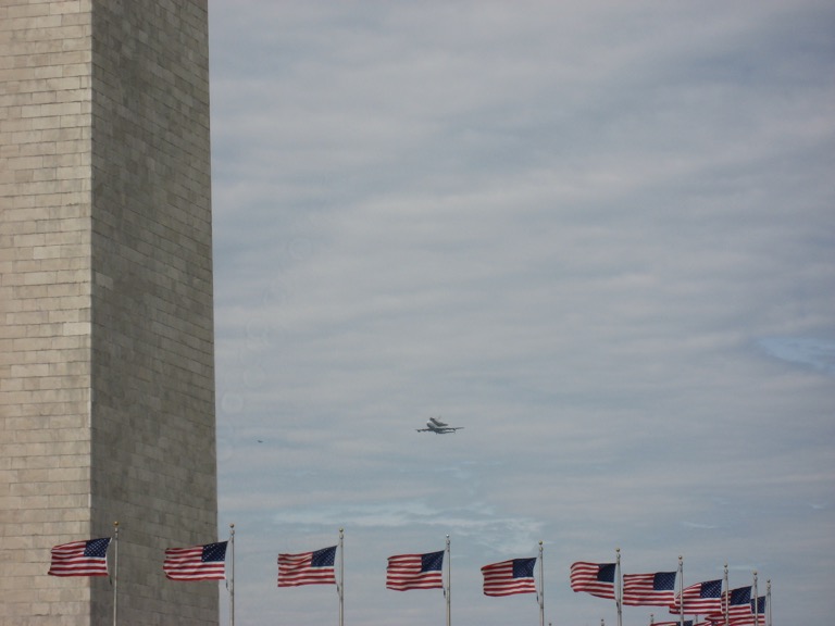 Discovery approaching the Washington Monument