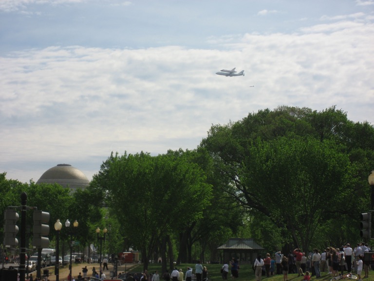 Discovery over the National Museum of Natural History.