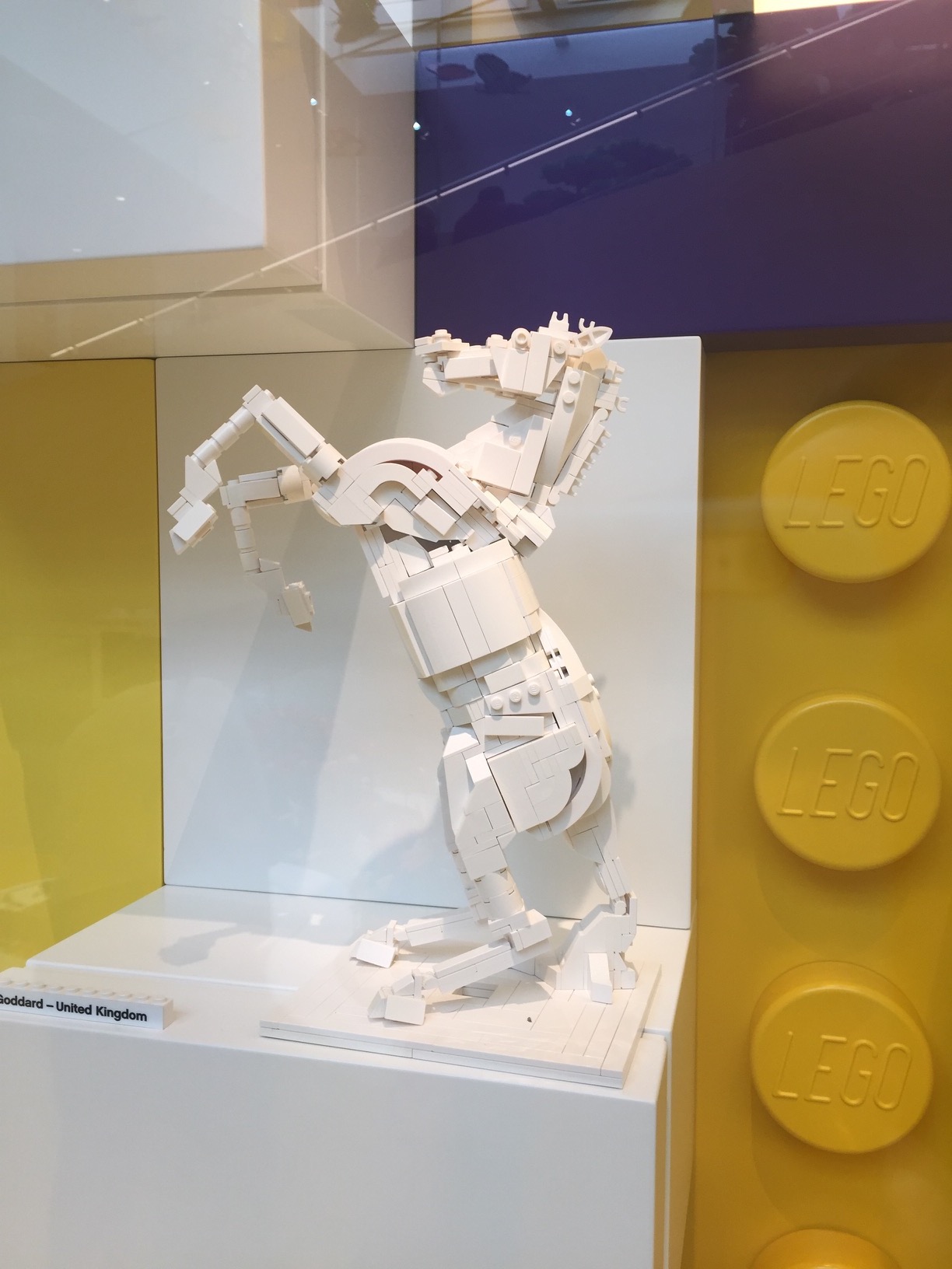 A rearing horse made of white LEGO.
